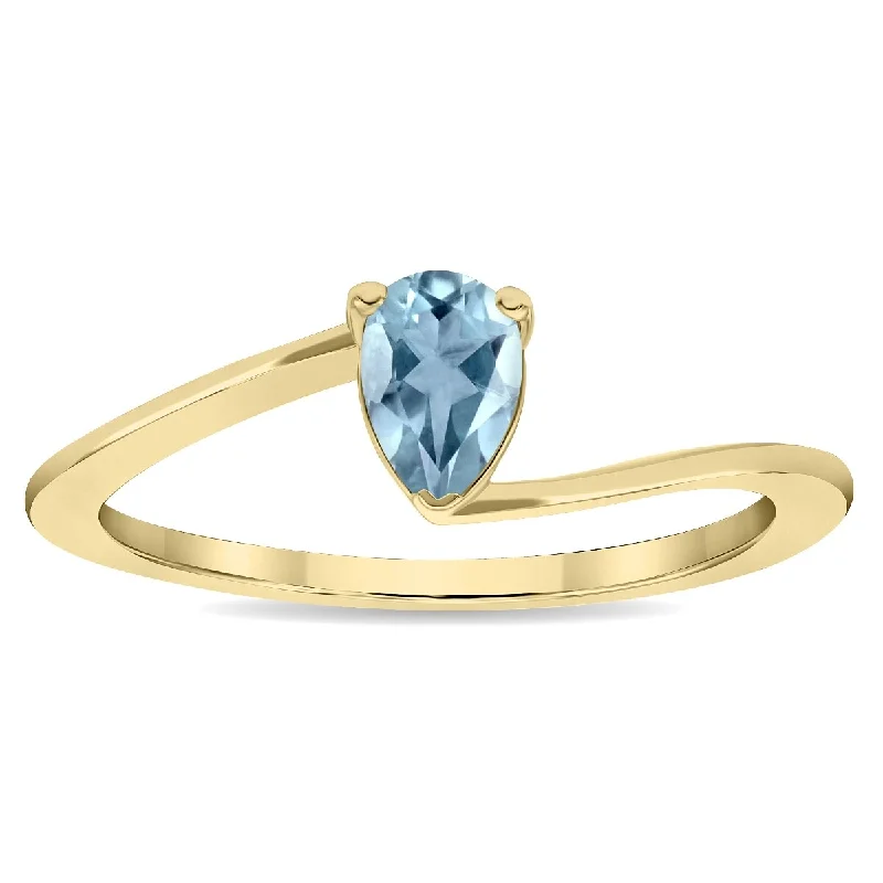 wedding sets with rings -Women's Solitaire Pear Shaped Aquamarine Wave Ring in 10K Yellow Gold