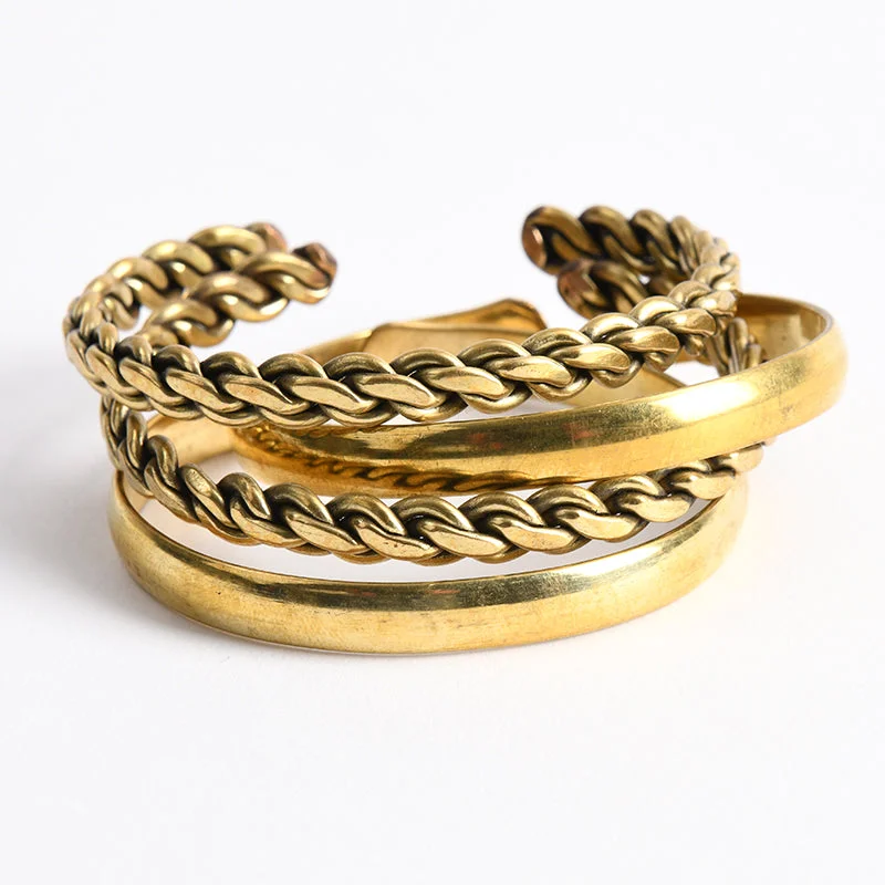 gold-tone bangles for women -Kiss Twist Cuff Set/4